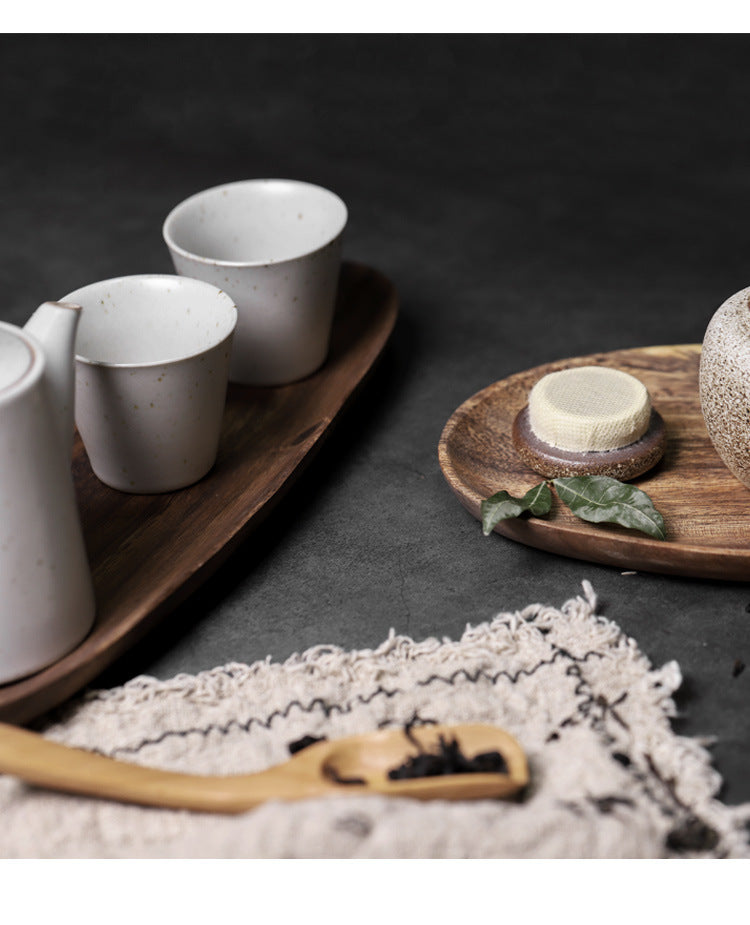 Handcrafted black walnut serving tray by WoodyKitchenware, irregular shape ideal for sushi, tea, fruits, and snacks.
