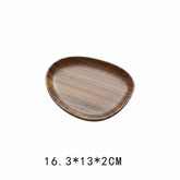 Handcrafted black walnut serving tray by WoodyKitchenware, irregular shape ideal for sushi, tea, fruits, and snacks.