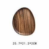 Handcrafted black walnut serving tray by WoodyKitchenware, ideal for sushi, tea, fruits, and snacks, with an irregular shape and natural finish.