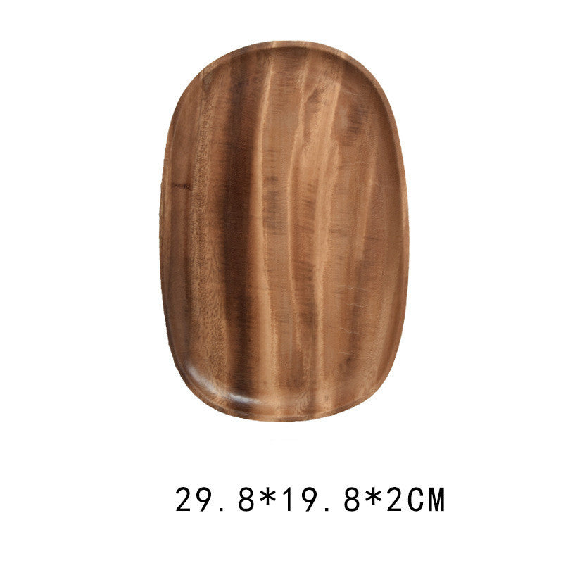 Handcrafted black walnut serving tray by WoodyKitchenware, irregular shape ideal for sushi, tea, fruits, and snacks.