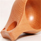Hand-carved minimalist wooden vessel from WoodyKitchenware, The Sylvan Solace by WoodyKitchenware, featuring smooth, natural wood grain.
