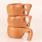 Hand-carved minimalist wooden vessel from WoodyKitchenware, showcasing smooth, natural wood grain and simple elegant design.