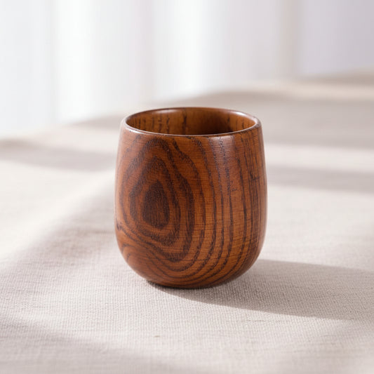 Hand-carved wooden Kuksa mug from WoodyKitchenware featuring intricate patterns, crafted by WoodyKitchenware.
