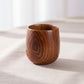Hand-carved wooden Kuksa mug from WoodyKitchenware featuring intricate patterns, crafted by WoodyKitchenware.