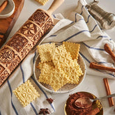 Wooden square embossed rolling pin with window grille pattern from WoodyKitchenware, showing detailed carved design on a light wooden surface.