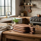 Black Walnut pizza tray by WoodyKitchenware, rustic and elegant, with a natural wood finish perfect for serving homemade pizza.