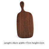 Black walnut pizza tray by WoodyKitchenware with a rustic finish, measuring 36x17x2cm, perfect for serving homemade pizza.