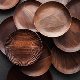 Black Walnut round breakfast tray by WoodyKitchenware, showing a smooth wooden serving tray with handles for morning use.