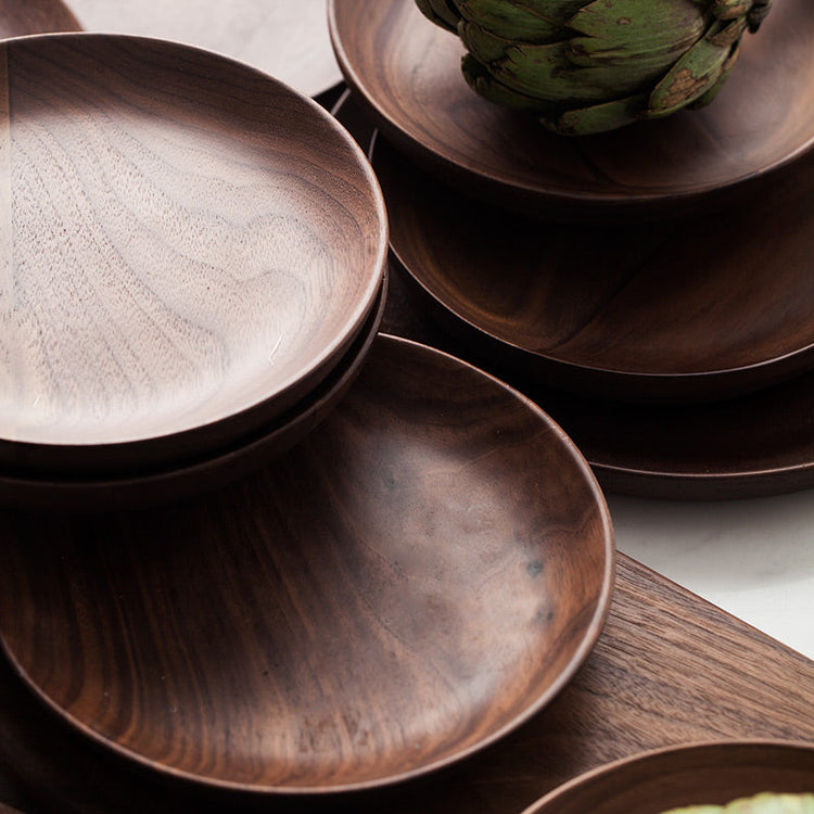 Black Walnut round breakfast tray by WoodyKitchenware, with handles, suitable for serving breakfast in elegant kitchen or dining settings.