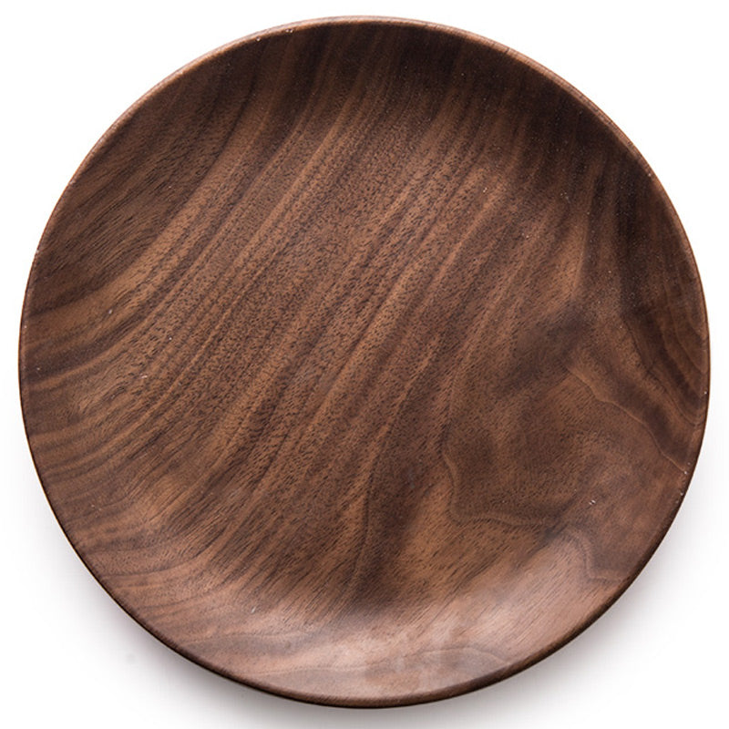 Black Walnut round breakfast tray by WoodyKitchenware, featuring smooth wood surface and sturdy handles for serving.
