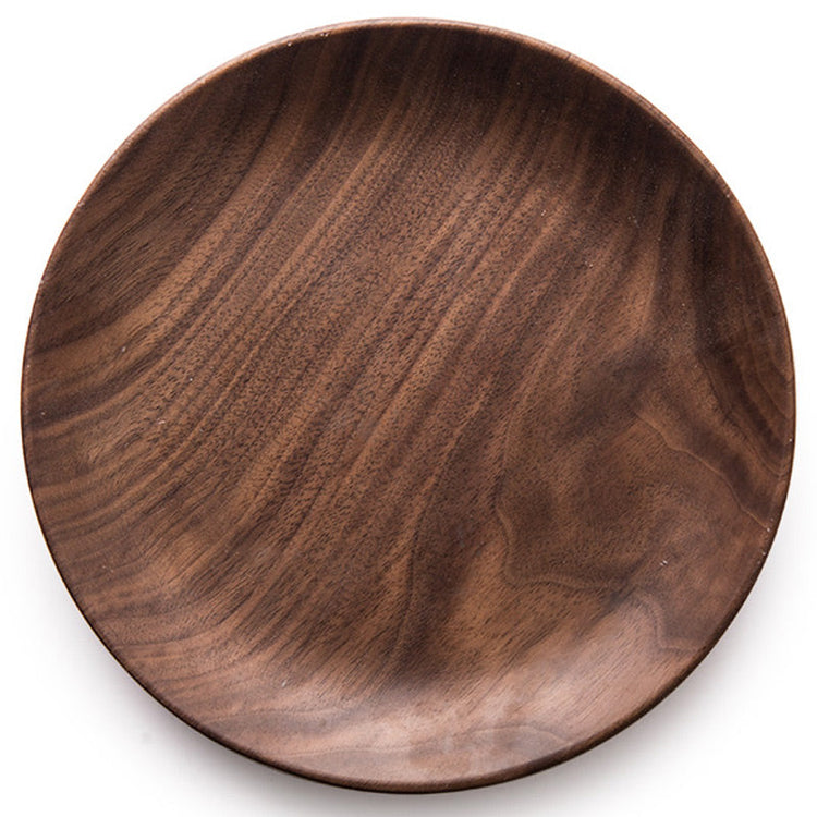 Black Walnut round breakfast tray by WoodyKitchenware, featuring smooth wood surface and sturdy handles for serving.