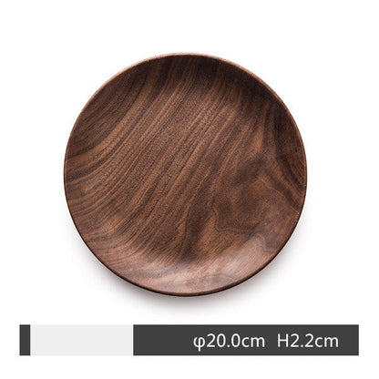 Black Walnut round breakfast tray by WoodyKitchenware, featuring a smooth finish and sturdy handles for serving.