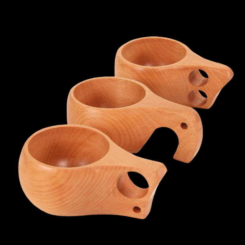 Hand-carved beechwood Kuksa cup from WoodyKitchenware, featuring a single-hole design and natural wood grain.
