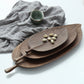 Small handmade wooden tray by WoodyKitchenware, featuring a glossy beech wood finish and forest sculpture design.