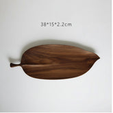 Small handmade wooden tray by WoodyKitchenware, featuring glossy beech wood with forest sculpture design, perfect for serving.