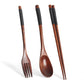 Black long handle couple spoon and chopsticks set by WoodyKitchenware, portable wooden tableware for travel and dining.
