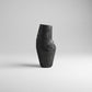 Black wooden vase by WoodyKitchenware, sculptural obelisk design crafted from solid timber, ideal for modern decorative displays.