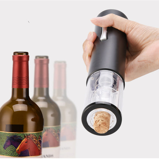 Black electric wine opener set by WoodyKitchenware including automatic corkscrew, foil cutter, and can opener on a sleek countertop.