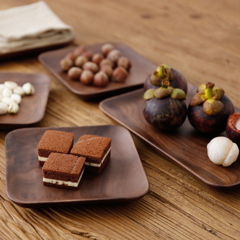 Japanese-style black walnut wooden plate by WoodyKitchenware, elegant square tray for breakfast and snacks with natural wood grain.