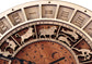 Handcrafted wooden astronomical clock by WoodyKitchenware featuring celestial design and bronze accents, 30cm diameter.