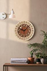 Handcrafted wooden astronomical clock by WoodyKitchenware, featuring celestial details and a bronze finish, 30cm diameter.