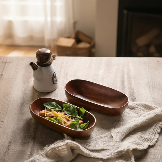 WoodyKitchenware acacia wooden canoe-shaped bowl, natural brown finish, perfect for serving or decorative table display.