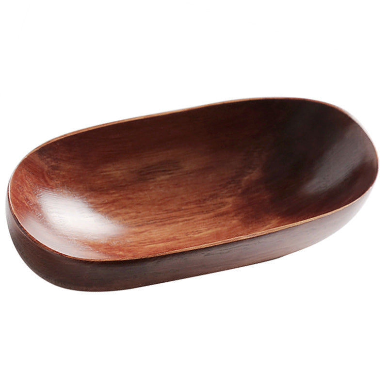 Brown acacia wooden canoe by WoodyKitchenware, a natural wooden serving or decorative canoe for tabletop use.