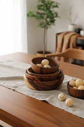 Natural wooden bowl from WoodyKitchenware, ideal for serving salads or snacks in a stylish kitchen setting.