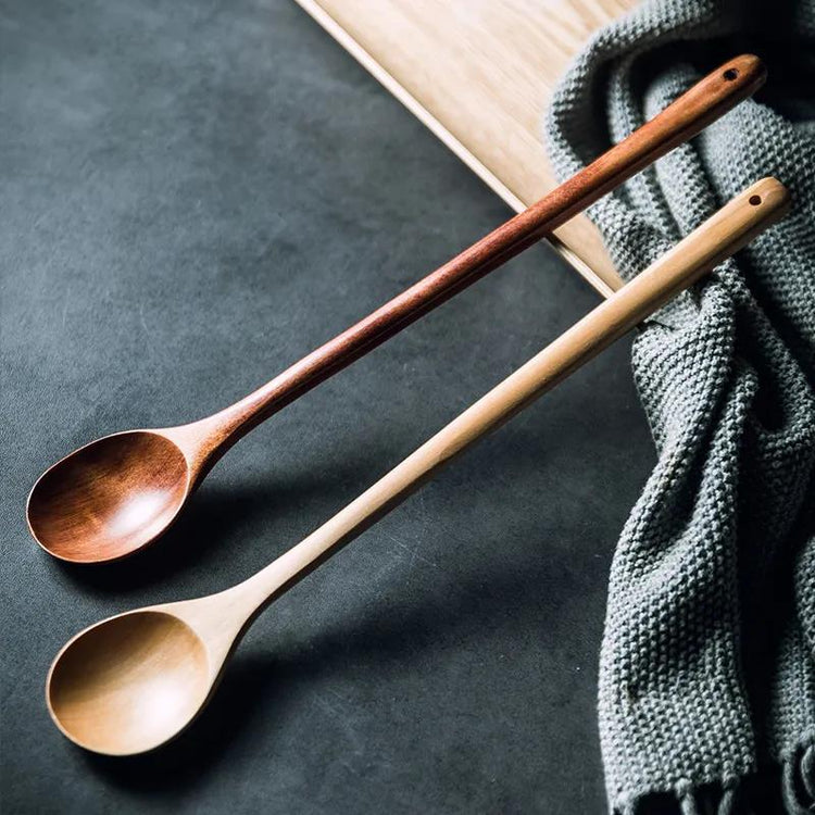 Extra-long wooden cooking spoon from WoodyKitchenware, ideal for stirring deep pots and cooking with durable wood.
