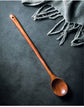 Extra-long wooden cooking spoon by WoodyKitchenware, ideal for stirring deep pots, with a smooth brown finish and ergonomic handle.