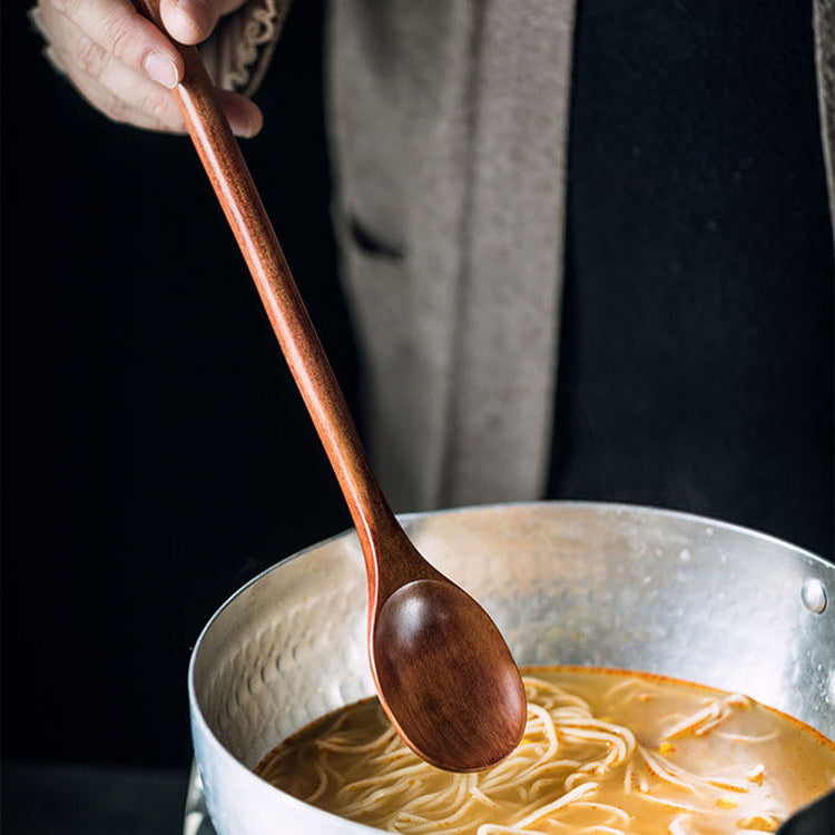 Long wooden cooking spoon by WoodyKitchenware, ideal for deep pots and stirring, with a smooth brown finish.