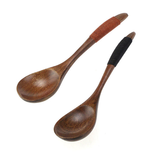 Set of three brown wooden spoons with tie wires from WoodyKitchenware by WoodyKitchenware, ideal for kitchen and table use