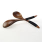 Set of three brown wooden spoons with tie wires from WoodyKitchenware, crafted by WoodyKitchenware, perfect for kitchen use.