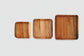 Rectangular acacia wooden plate by WoodyKitchenware with natural wood grain for elegant dining presentation.