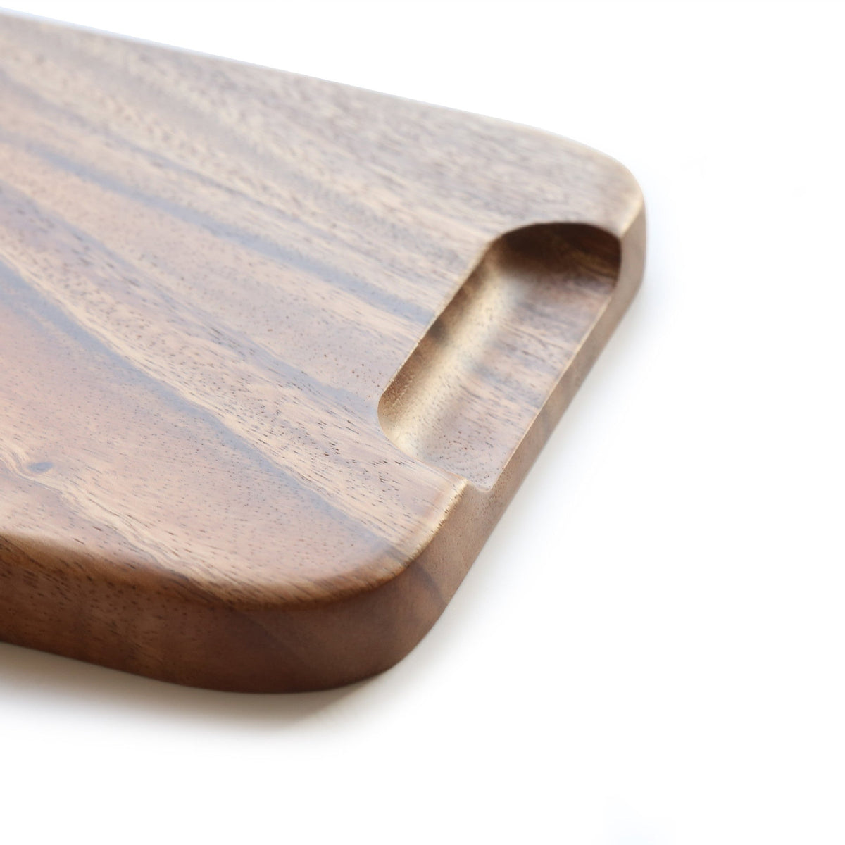 Rectangular acacia wooden plate from WoodyKitchenware, ideal for serving appetizers or snacks in a stylish dining setting.