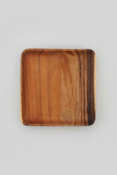 Rectangular wooden plate made of acacia wood from WoodyKitchenware, ideal for serving appetizers and enhancing dining presentation.