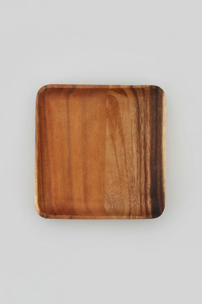 Rectangular wooden plate made of acacia wood from WoodyKitchenware, ideal for serving appetizers and enhancing dining presentation.