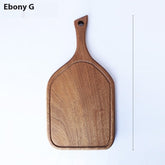 Solid wood vegetable cutting board by WoodyKitchenware with a large handle, durable, eco-friendly kitchen essential.