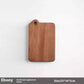Solid wood vegetable cutting board by WoodyKitchenware, durable eco-friendly kitchen essential with a large handle.