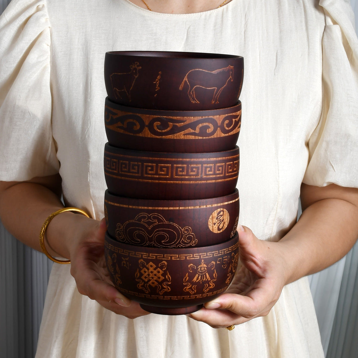 Carved wooden bowl with cattle, horse, and sheep designs by WoodyKitchenware, made from solid timber, Heritage Blessing collection.