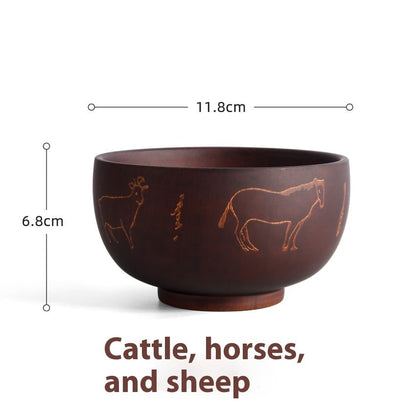 Carved wooden bowl featuring cattle, horse, and sheep designs by WoodyKitchenware in solid timber, Heritage Blessing collection.