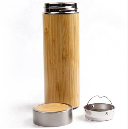 Hand-finished bamboo and steel vessel from WoodyKitchenware, The Zen Infuser, showcasing elegant craftsmanship and natural materials.