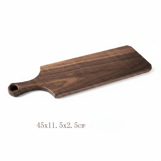 Black Walnut Log Breadboard by WoodyKitchenware, raw rustic wood with natural grain, perfect for serving and food prep.