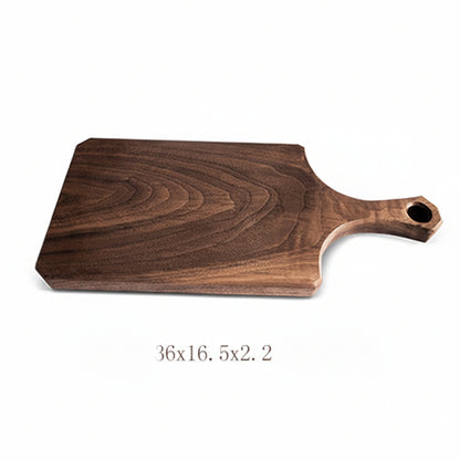 Black Walnut Log Breadboard by WoodyKitchenware, rustic and raw wood with natural grain, perfect for serving or food prep.