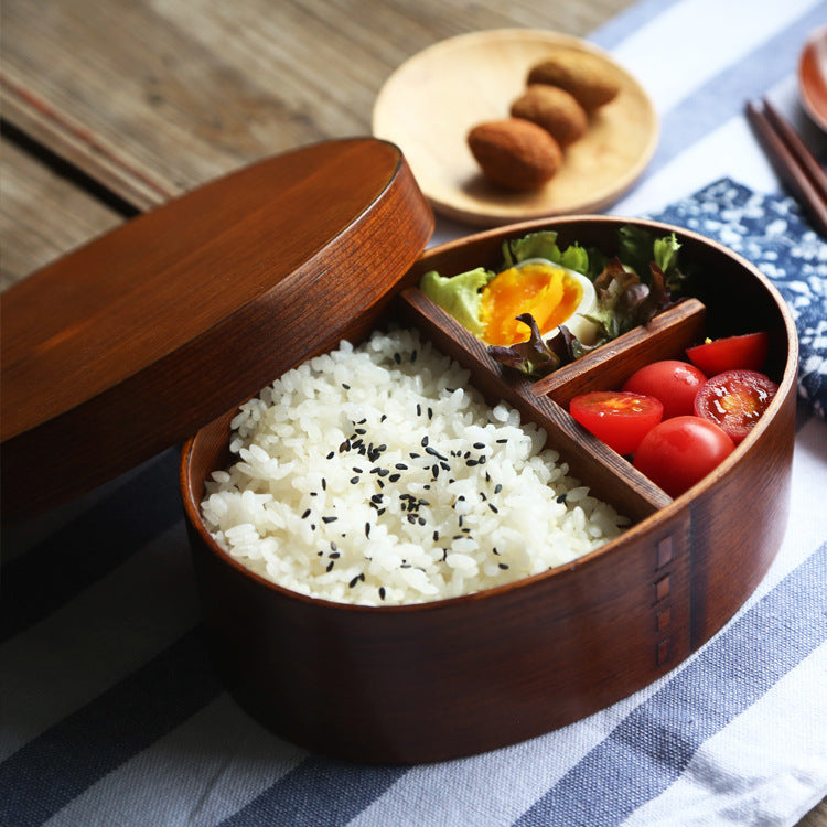 Round brown wooden bento box from WoodyKitchenware, traditional Japanese lunch box made of natural wood with a smooth finish.