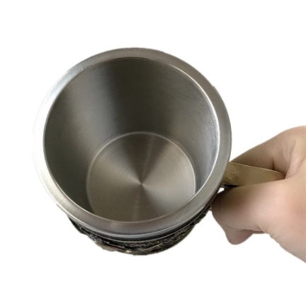 Stainless steel goblet by WoodyKitchenware featuring a sword design, perfect for drinking and display.