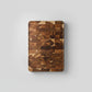 Dark brown Acacia Mangium thick cutting board by WoodyKitchenware, durable and stylish kitchen essential, measuring 35x25x2.6 cm.