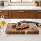 Dark brown Acacia Mangium thick cutting board by WoodyKitchenware, durable and stylish kitchen essential for food prep.