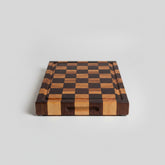 Dark brown Acacia Mangium thick cutting board by WoodyKitchenware, durable and stylish kitchen essential, 35x25x2.6cm.