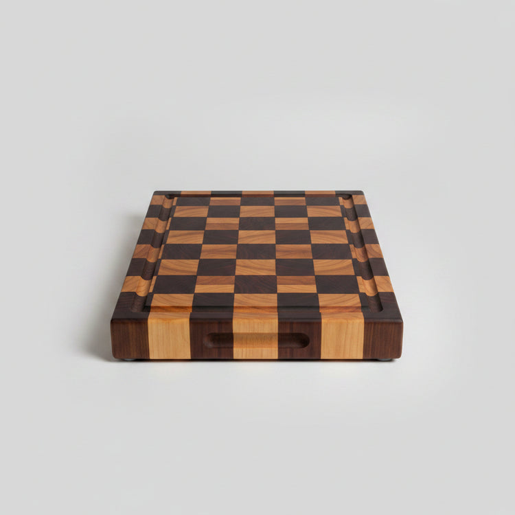 Dark brown Acacia Mangium thick cutting board by WoodyKitchenware, durable and stylish kitchen essential, 35x25x2.6cm.